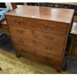 Georgian mahogany chest of four long graduating drawers with brass handles, raised on bracket feet