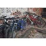 Seven various mountain bikes including Giant, Carrera etc. [bp 21 22 24 19 18 20 ?]