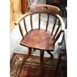 Early 20th century spindle back and elm seated swivel chair