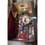 A brass bound mahogany box containing a collection of vintage buttons, two more tins of buttons, bag