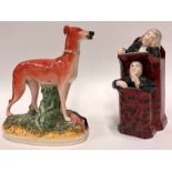 An early 19th century Staffordshire pottery pulpit group with a sleeping vicar and Moses, 25 cm high