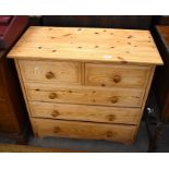 A small pine chest of two short over three long drawers