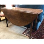 A 19th century mahogany drop-leaf dining table on pad feet to/w a folding card table (2)