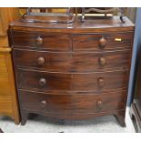 A 19th century mahogany bowfront chest of two short over three long drawers raised on splayed