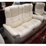 A 'Stressless' cream leather two seater sofa