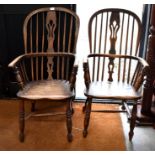 A pair of elm spindle back  Windsor armchairs with turned legs and stretchers