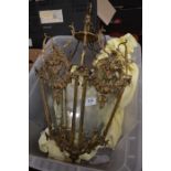 A floral and foliate gilt metal and etched glass hanging porch lantern