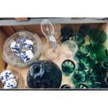 A collection of 19th century and later green drinking glasses, a green onion shaped bottle with