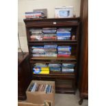 Three shelves and a box of books relating to fighter aircraft and airborne battles