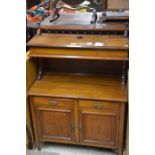 Edwardian walnut side cabinet, the raised back with hinged top over two drawers and panelled