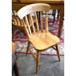 A set of four Ash dining chairs with turned legs and stretchers