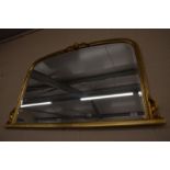 A gilt framed overmantel mirror with beaded decoration