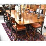 Regency style twin pedestal '1964 Old Wood' dining table with single central leaf, turned columns