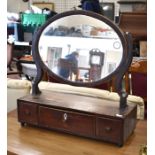 A 19th century toilet mirror on three drawer platform base to/w oval mahogany framed mirror (2)