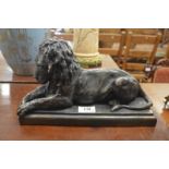A cold cast bronze recumbent lion ltd 332/750 by Ron Moll