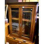 19th century mahogany bookcase with a pair of glazed doors enclosing shelves