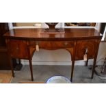 Sheraton style mahogany inlaid bow front sideboard with three drawers raised on tapering square