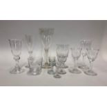 A collection of ten glasses including:  A wine glass and two matching sherry/port glasses in the