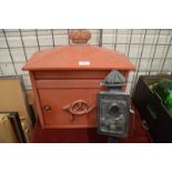 A replica red painted post box, to/w a vintage coach lamp (2)