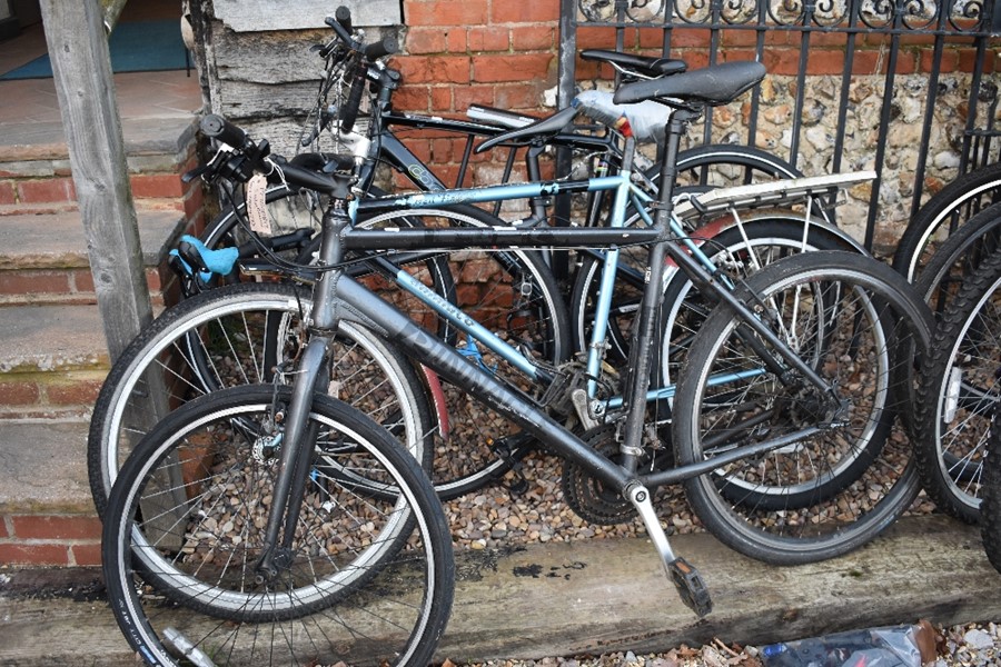 Four various bikes including a Boardman hybrid, B-Twin road bike and two others to/w a bag of