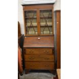 Edwardian mahogany inlaid bureau bookcase, the glazed doors enclosing two shelves over a fall