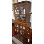 19th century mahogany display cabinet with two pairs of astragal glazed doors enclosing shelves