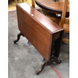 A Victorian mahogany Sutherland drop leaf tea table on gate-leg action supports