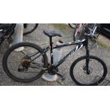 A Specialized Hardrock mountain bike with black frame [bp11]