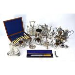 A three-piece silver condiment set, to/w various electroplated items, include two cruet stands,