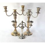 A pair of electroplated twin branch candelabra, 39 cm high, to/w a single, smaller, candelabrum (3)