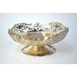 A foliate-pierced silver fruit bowl on stemmed foot, Mappin & Webb, Sheffield 1930, 17.3 oz, 23 cm