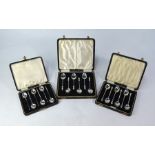 Three sets of six silver coffee spoons, 3.1 oz total - two sets in original cases