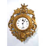 A late 19th century gilt metal and enamel French cartel clock, white enamelled dial with roman