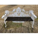 A Victorian cast iron Coalbrookdale design garden bench, oak and elm pattern modelled as trailing