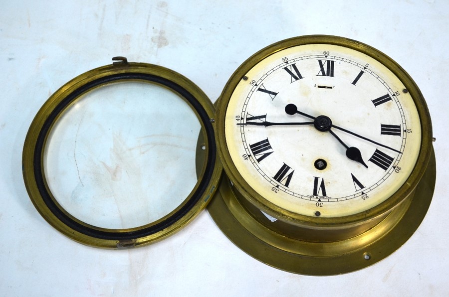 A vintage 8-day single fusee brass bulkhead clock, the white enamelled dial with Roman numerals, - Image 2 of 4