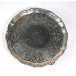 A George III silver card salver with later engraved decoration and gadrooned rim, on shell feet,