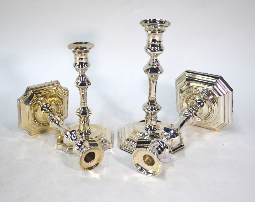 Two pairs of epns baluster candlesticks in the Georgian manner, 24 cm and 20 cm high