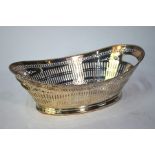 A Continental 800 grade pierced oval basket with beaded rim and end handles, 15.8 oz, 30 cm long