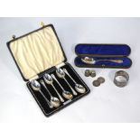 A cased set of six silver coffee spoons, Birmingham 1940, to/w a cased Christening spoon,