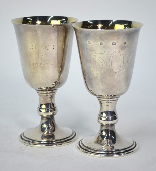 A pair of silver goblets on baluster stems, Francis Howard Ltd., Sheffield 1997, 9.3 oz, 14 cm