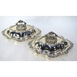 A pair of good quality epns entree dishes and covers with cast handles