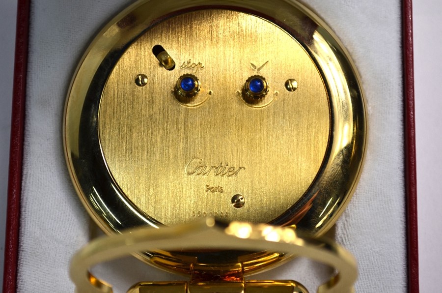 A Cartier Colisee gilt and lacquer travel alarm strut clock, no. 0500244 circa 1980, in fitted - Image 3 of 6