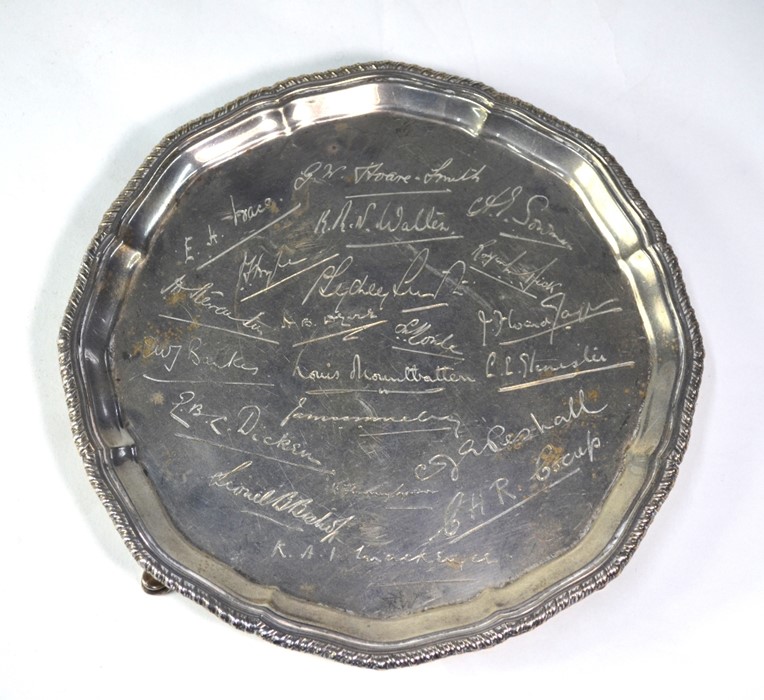 Naval Interest: A silver salver with gadrooned rim and four hoof feet, engraved with facsimile