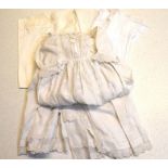 WITHDRAWN A collection of Victorian and later laundered infants clothing to include; christening