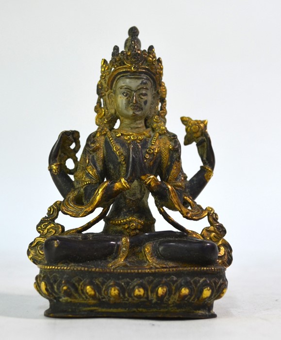 A Sino-Tibetan style gilded metal figure of the Bodhisattva, Avalokiteshvara with the principal