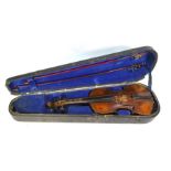 A late 19th century German violin with 36 cm two-piece flame mahogany back, in worn condition, to/