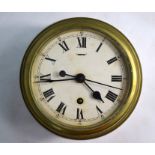 A vintage 8-day single fusee brass bulkhead clock, the white enamelled dial with Roman numerals,