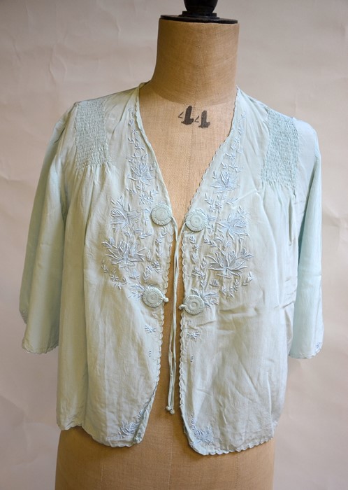 WITHDRAWN A pale blue silk velvet bed jacket edged in cream lace, a pale blue Chinese silk bed - Image 2 of 10