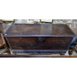 An 18th century oak plank mule chest, the hinged top over an incscribed fron 'WS 1722', over two