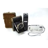 A Zeiss Ikon Ikonta folding camera with Compur Tessar 1:45 f.5cm lens, no 1151542 to/w a Minolta-